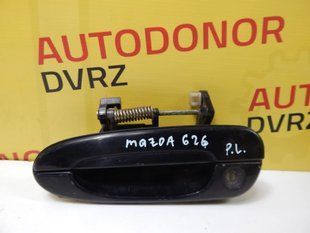 Ручка передніх лівих дверей зовнішня чорна Mazda 626 1991 - 1997 9164337 фото